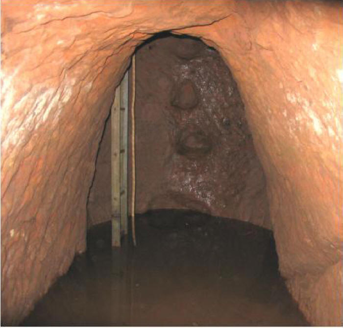 Water collecting at the bottom of the Tom's Shaft in Cobalt Mine Water collecting at the bottom of the Tom's Shaft in Cobalt Mine