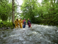 Team photo standing (just) in the Little Neath River