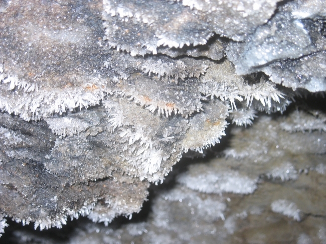 Some crystals, possibly gypsum, in the roof
