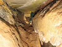 In the adit following the fault (The adit turns along the fault (left hand wall))
