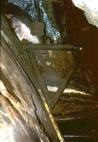Timber shuttering to hold back material that had been tipped into the mine