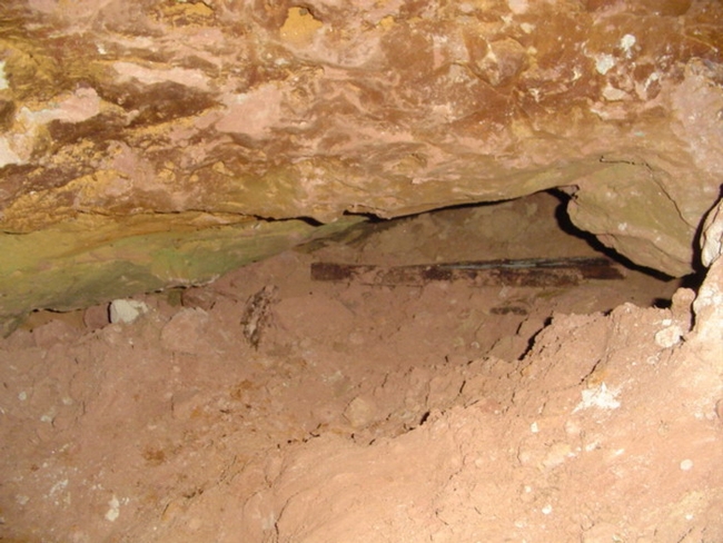 The passage at the bottom of Plank Shaft awaiting exploration