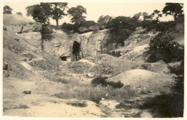 Picture from 1923 of entrance with rough fence