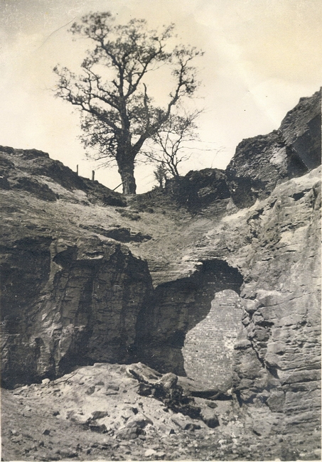 Entrance bricked up, maybe 1960s, hole in wall