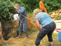 Liz helping Pete to raise buckets :: Taken by Nigel Dibben